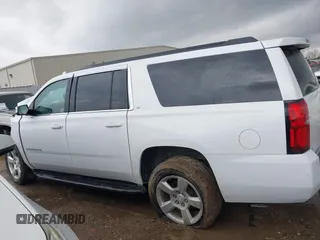 2020 Chevrolet Suburban LT z VIN 1GNSCHKC9LR284936, wystawiony jako IAAI lot #41196246 z przebiegiem Nie podano mil oraz . Historia ofert i sprzedaży dostępna na DreamBid. Obrazek 14.