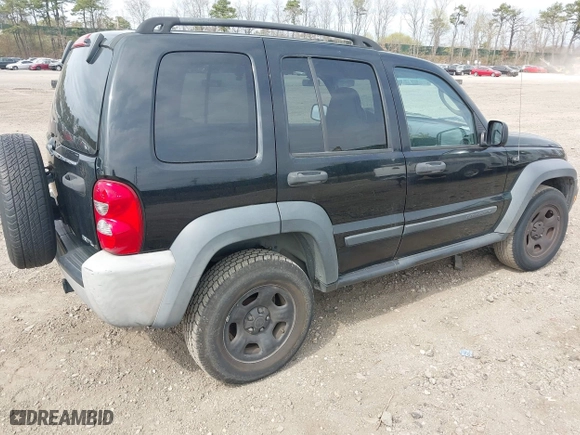 2006 Jeep Liberty Sport with VIN 1J8GL48K66W143231, listed as a IAAI auction lot 42040322 with 241,263 mi miles. Bid and sale history available at carsss.com. Image 4.