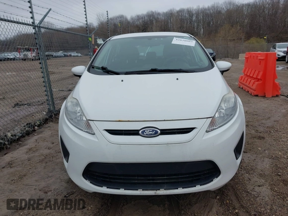 2013 Ford Fiesta SE with VIN 3FADP4EJ8DM193710, listed as a IAAI auction lot 42020003 with 95,625 mi miles. Bid and sale history available at carsss.com. Image 6.
