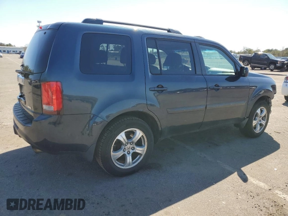 2012 Honda Pilot EX-L with VIN 5FNYF4H5XCB007889, listed as a Copart auction lot 52284075 with 318,329 mi miles and Salvage Title. Bid and sale history available at DreamBid. Image 3.