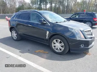 2012 Cadillac SRX Luxury Collection with VIN 3GYFNDE3XCS582993, listed as a IAAI auction lot 42165864 with 137,009 mi miles. Bid and sale history available at carsss.com. Image 1.