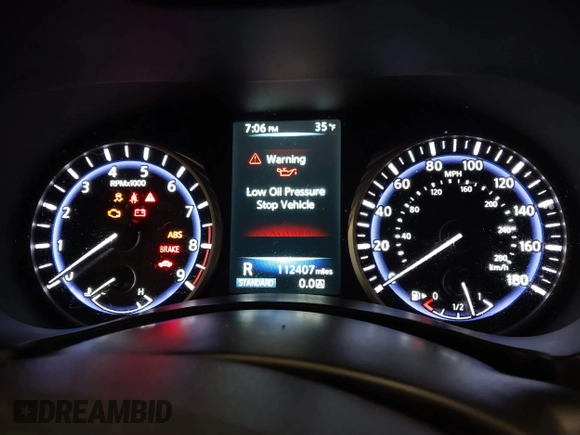 2015 Infiniti Q50 Premium z VIN JN1BV7AR0FM417283, wystawiony jako IAAI lot #41579549 z przebiegiem 112 407 mil mil oraz . Historia ofert i sprzedaży dostępna na DreamBid. Obrazek 7.