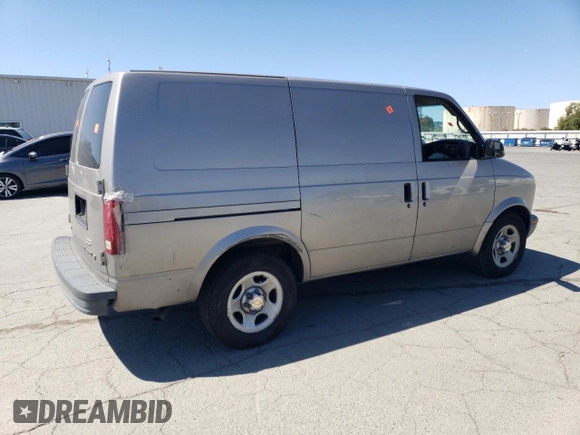 2003 Chevrolet Astro Cargo z VIN 1GCDM19X73B137764, wystawiony jako Copart lot #57367915 z przebiegiem Nie podano mil oraz Czysty tytuł • Clean title. Historia ofert i sprzedaży dostępna na DreamBid. Obrazek 3.