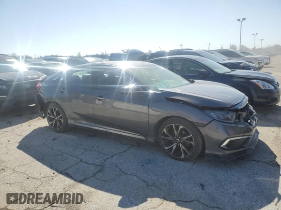 2019 Honda Civic Sport with VIN 2HGFC2F85KH581389, listed as a Copart auction lot 47922085 with 56,050 mi miles and Salvage Title. Bid and sale history available at DreamBid. Image 4.