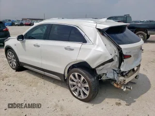 2023 Cadillac XT4 FWD Premium Luxury with VIN 1GYFZCR42PF110122, listed as a Copart auction lot 57332955 with 11,427 mi miles and Salvage title. Bid and sale history available at DreamBid. Image 2.