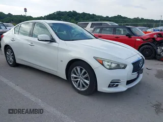 2015 Infiniti Q50 z VIN JN1BV7ARXFM391498, wystawiony jako IAAI lot #42538882 z przebiegiem 164 808 mil mil oraz . Historia ofert i sprzedaży dostępna na DreamBid. Obrazek 1.
