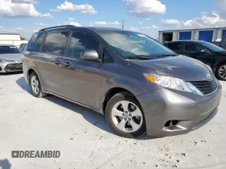 2014 Toyota Sienna LE AAS with VIN 5TDKK3DC8ES445454, listed as a Copart auction lot 62014095 with 143,601 mi miles and Salvage title. Bid and sale history available at DreamBid. Image 4.