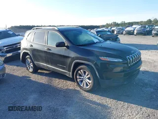 2015 Jeep Cherokee Sport with VIN 1C4PJLAB7FW707146, listed as a IAAI auction lot 40901975 with 100,107 mi miles. Bid and sale history available at carsss.com. Image 1.
