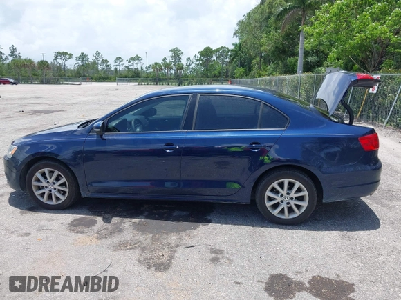 2012 Volkswagen Jetta SE with VIN 3VWDP7AJ4CM370055, listed as a IAAI auction lot 42501456 with 90,800 mi miles and . Bid and sale history available at DreamBid. Image 14.