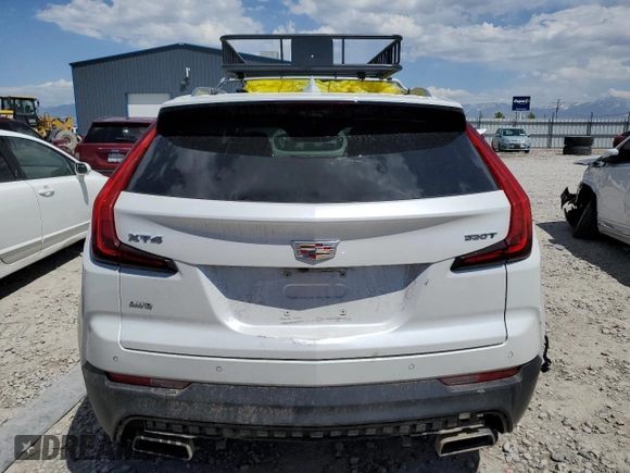 2023 Cadillac XT4 AWD Premium Luxury with VIN 1GYFZDR46PF130198, listed as a Copart auction lot 57763285 with 8,346 mi miles and Salvage title. Bid and sale history available at DreamBid. Image 6.
