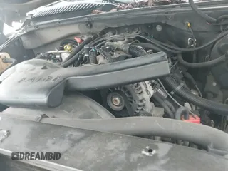 2002 GMC Yukon SLT z VIN 1GKEK13Z72R215930, wystawiony jako IAAI lot #42024342 z przebiegiem 294 069 mil mil oraz . Historia ofert i sprzedaży dostępna na DreamBid. Obrazek 18.