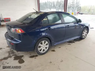 2014 Mitsubishi Lancer ES with VIN JA32U2FU8EU020112, listed as a IAAI auction lot 41990121 with 123,892 mi miles. Bid and sale history available at carsss.com. Image 4.