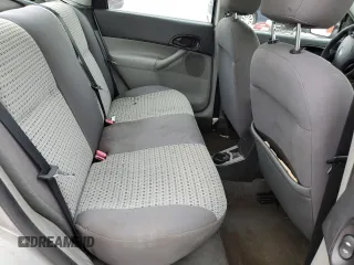 2007 Ford Focus S z VIN 1FAFP34N37W293421, wystawiony jako Copart lot #57833445 z przebiegiem 159 523 mil mil oraz Szkoda całkowita • Salvage title. Historia ofert i sprzedaży dostępna na DreamBid. Obrazek 10.