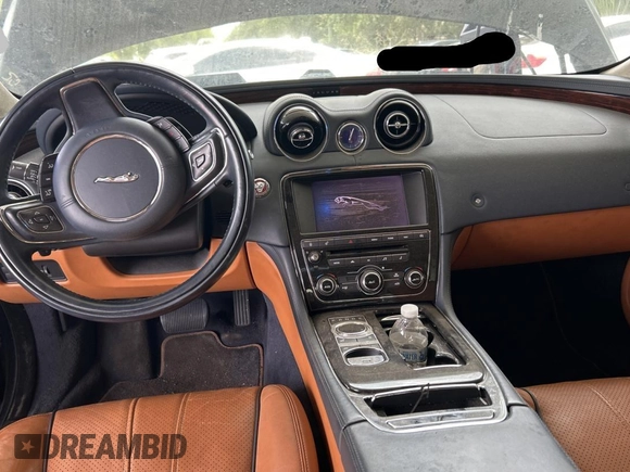 2013 Jaguar XJ z VIN SAJWA1C73D8V44829, wystawiony jako Copart lot #59194045 z przebiegiem 87 083 mil mil oraz Czysty tytuł • Clean title. Historia ofert i sprzedaży dostępna na DreamBid. Obrazek 9.