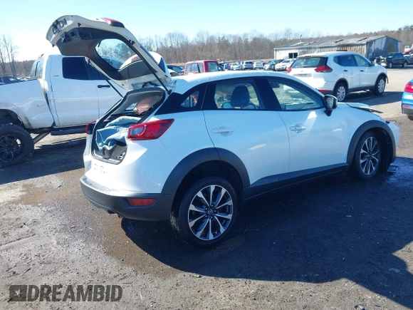 2019 Mazda CX-3 Touring with VIN JM1DKFC70K0428242, listed as a IAAI auction lot 41571896 with 109,172 mi miles. Bid and sale history available at carsss.com. Image 4.