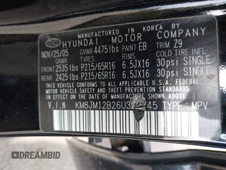 2006 Hyundai Tucson GL with VIN KM8JM12B26U340745, listed as a IAAI auction lot 42129680 with 87,133 mi miles. Bid and sale history available at carsss.com. Image 9.