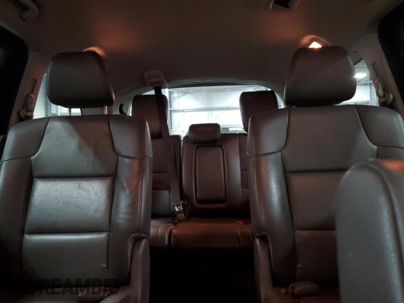 2013 Honda Odyssey Touring with VIN 5FNRL5H90DB071415, listed as a Copart auction lot 52697785 with 200,430 mi miles and Salvage Title. Bid and sale history available at carsss.com. Image 10.