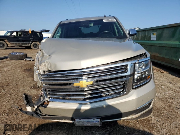 2015 Chevrolet Tahoe LTZ z VIN 1GNSKCKC5FR100084, wystawiony jako Copart lot #68003764 z przebiegiem Nie podano mil oraz Czysty tytuł • Clean title. Historia ofert i sprzedaży dostępna na DreamBid. Obrazek 5.