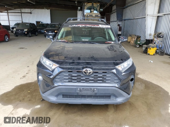 2019 Toyota RAV4 XLE Premium with VIN JTMA1RFV5KD026145, listed as a Copart auction lot 48238125 with 101,443 mi miles and Salvage Title. Bid and sale history available at carsss.com. Image 5.