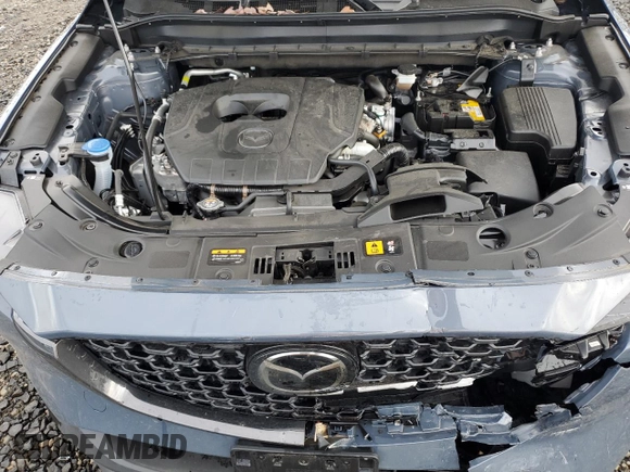 2024 Mazda CX-5 S Carbon Edition z VIN JM3KFBCM4R0392759, wystawiony jako Copart lot #45571245 z przebiegiem 7594 mil mil oraz Szkody całkowita. Historia ofert i sprzedaży dostępna na DreamBid. Obrazek 13.