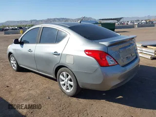 2014 Nissan Versa SV with VIN 3N1CN7AP0EL841381, listed as a IAAI auction lot 42016744 with 137,699 mi miles. Bid and sale history available at carsss.com. Image 3.