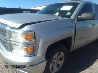 2014 Chevrolet Silverado 1500 LT with VIN 1GCVKREC7EZ120159, listed as a IAAI auction lot 41191282 with 206,836 mi miles and . Bid and sale history available at DreamBid. Image 18.