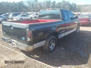 1997 Ford F-150 with VIN 1FTDX1727VKD59948, listed as a IAAI auction lot 41659013 with 257,047 mi miles and . Bid and sale history available at DreamBid. Image 4.