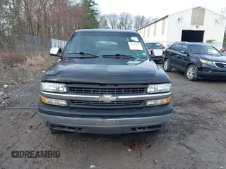 2000 Chevrolet Silverado 1500 LS with VIN 2GCEK19T5Y1292800, listed as a IAAI auction lot 42005453 with 100,332 mi miles. Bid and sale history available at carsss.com. Image 6.