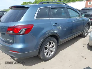 2014 Mazda CX-9 Touring with VIN JM3TB3CV8E0441535, listed as a IAAI auction lot 42355526 with 155,826 mi miles and . Bid and sale history available at DreamBid. Image 4.