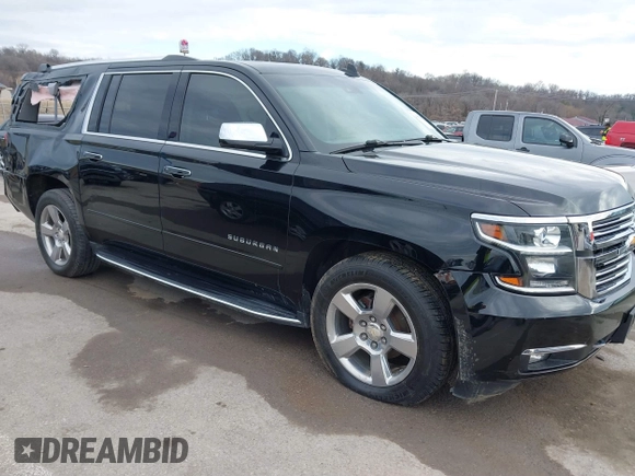 2019 Chevrolet Suburban Premier with VIN 1GNSKJKC7KR261826, listed as a IAAI auction lot 41652451 with 127,032 mi miles and . Bid and sale history available at DreamBid. Image 1.