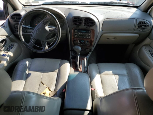 2004 Oldsmobile Bravada z VIN 1GHDT13S042281331, wystawiony jako Copart lot #71484164 z przebiegiem 209 555 mil mil oraz Szkody całkowita. Historia ofert i sprzedaży dostępna na DreamBid. Obrazek 8.