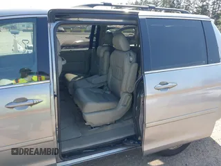 2009 Honda Odyssey EX-L with VIN 5FNRL38779B013943, listed as a IAAI auction lot 42119422 with 147,285 mi miles. Bid and sale history available at carsss.com. Image 6.