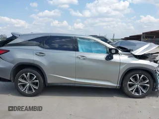 2019 Lexus RX 350L Premium with VIN JTJGZKCA5K2012847, listed as a IAAI auction lot 42331497 with 100,945 mi miles and . Bid and sale history available at DreamBid. Image 14.