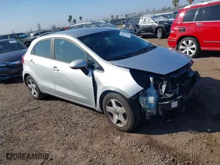 2016 Kia Rio LX with VIN KNADM5A32G6646236, listed as a IAAI auction lot 41593659 with 85,127 mi miles. Bid and sale history available at carsss.com. Image 1.