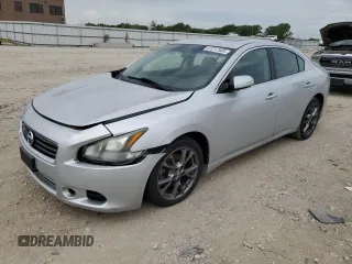 2014 Nissan Maxima S with VIN 1N4AA5AP9EC478357, listed as a Copart auction lot 57217585 with 118,524 mi miles and Salvage title. Bid and sale history available at DreamBid. Image 1.