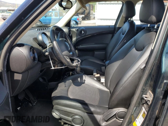 2014 MINI Countryman with VIN WMWZB3C51EWR40111, listed as a Copart auction lot 50274045 with 138,073 mi miles and Salvage title. Bid and sale history available at DreamBid. Image 7.
