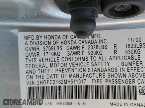 2021 Honda Civic LX z VIN 2HGFC2F62MH511317, wystawiony jako Copart lot #53383495 z przebiegiem 30 375 mil mil oraz Szkoda całkowita • Salvage title. Historia ofert i sprzedaży dostępna na DreamBid. Obrazek 14.