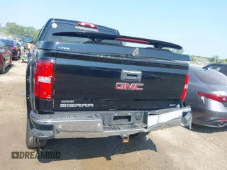 2014 GMC Sierra 1500 SLT with VIN 3GTU2VEC1EG363079, listed as a IAAI auction lot 42419679 with 128,055 mi miles and . Bid and sale history available at DreamBid. Image 16.