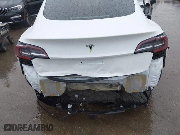 2023 Tesla Model 3 with VIN 5YJ3E1EA8PF578199, listed as a IAAI auction lot 41735465 with 50,823 mi miles and . Bid and sale history available at DreamBid. Image 6.
