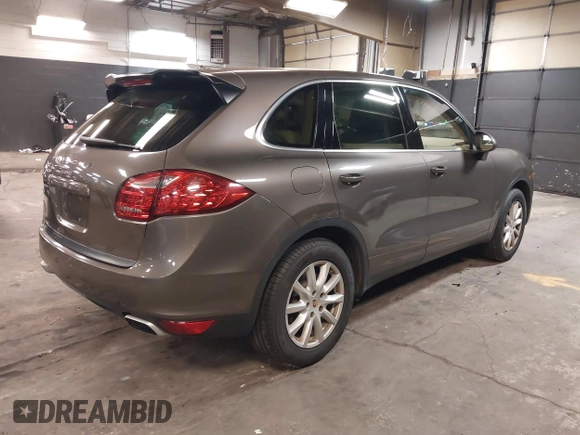2014 Porsche Cayenne with VIN WP1AA2A26ELA93026, listed as a IAAI auction lot 42272409 with 58,951 mi miles and . Bid and sale history available at DreamBid. Image 4.