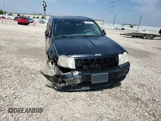 2007 Jeep Grand Cherokee Laredo z VIN 1J8GR48K17C668294, wystawiony jako Copart lot #56686165 z przebiegiem 245 172 mil mil oraz Szkoda całkowita • Salvage title. Historia ofert i sprzedaży dostępna na DreamBid. Obrazek 14.