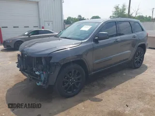 2018 Jeep Grand Cherokee Laredo E with VIN 1C4RJFAG7JC294905, listed as a IAAI auction lot 42452977 with 75,916 mi miles and . Bid and sale history available at DreamBid. Image 17.