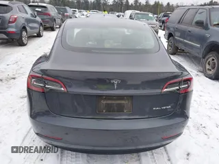 2023 Tesla Model 3 Long Range with VIN 5YJ3E1EBXPF708122, listed as a IAAI auction lot 41185314 with 27,765 mi miles and . Bid and sale history available at DreamBid. Image 16.