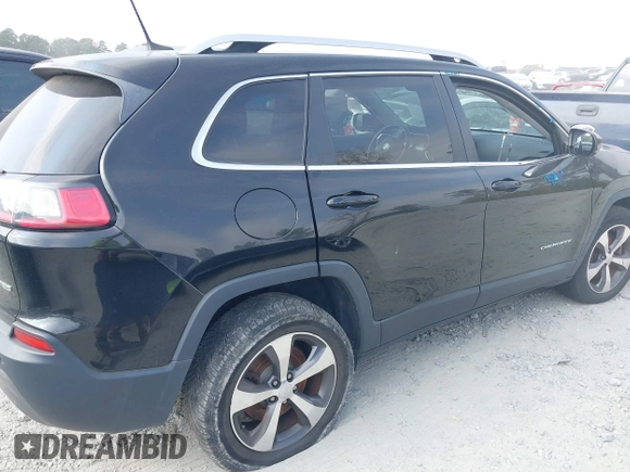 2019 Jeep Cherokee Limited with VIN 1C4PJMDX2KD235618, listed as a IAAI auction lot 40672263 with 82,117 mi miles and . Bid and sale history available at carsss.com. Image 6.