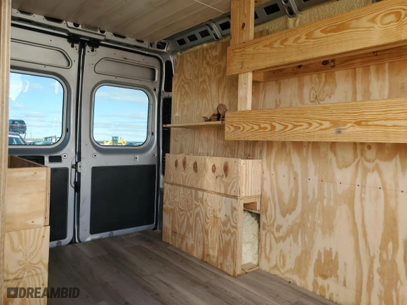 2016 Ram ProMaster Cargo Van with VIN 3C6TRVDG3GE106328, listed as a Copart auction lot 87297454 with 117,515 mi miles and Salvage Title. Bid and sale history available at carsss.com. Image 10.