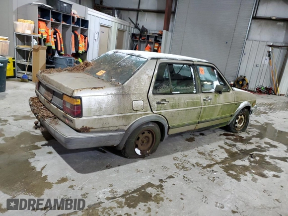 1985 Volkswagen Jetta z VIN WVWGH0166FW548455, wystawiony jako Copart lot #41714155 z przebiegiem Nie podano mil oraz Czysty tytuł • Clean title. Historia ofert i sprzedaży dostępna na DreamBid. Obrazek 3.