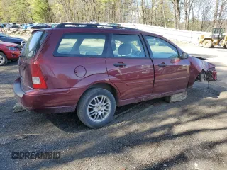 2007 Ford Focus SE with VIN 1FAFP36N87W183509, listed as a Copart auction lot 54649255 with 156,260 mi miles and Salvage title. Bid and sale history available at DreamBid. Image 3.