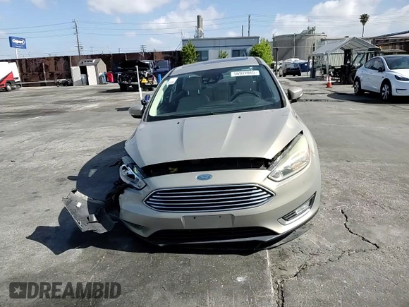2015 Ford Focus Titanium с VIN 1FADP3J28FL288037, выставлен на аукционе Copart как лот 56972865 с пробегом 75 703 миль миль и Списание • Salvage title. История ставок и продаж доступна на DreamBid. Изображение 14.
