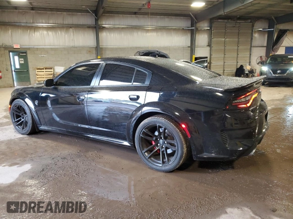 2021 Dodge Charger SRT Hellcat Widebody z VIN 2C3CDXL9XMH617917, wystawiony jako Copart lot #57069205 z przebiegiem 34 859 mil mil oraz Szkoda całkowita • Salvage title. Historia ofert i sprzedaży dostępna na DreamBid. Obrazek 2.