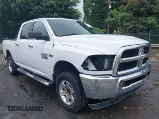2013 Ram 2500 SLT z VIN 3C6TR5DT7DG524758, wystawiony jako IAAI lot #42333873 z przebiegiem Nie podano mil oraz . Historia ofert i sprzedaży dostępna na DreamBid. Obrazek 1.